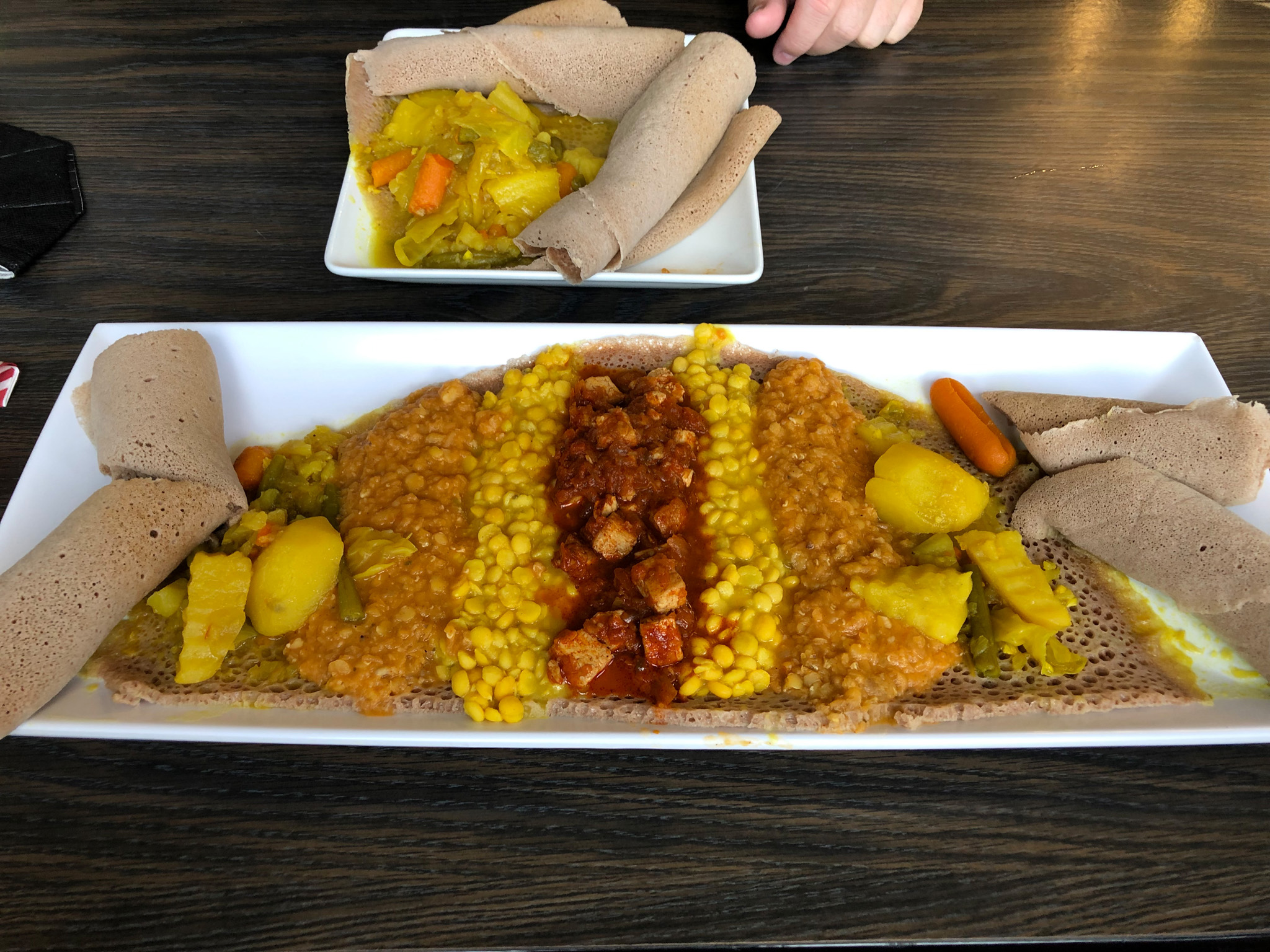 A big plate of Ethiopian food from The Nile Vegan