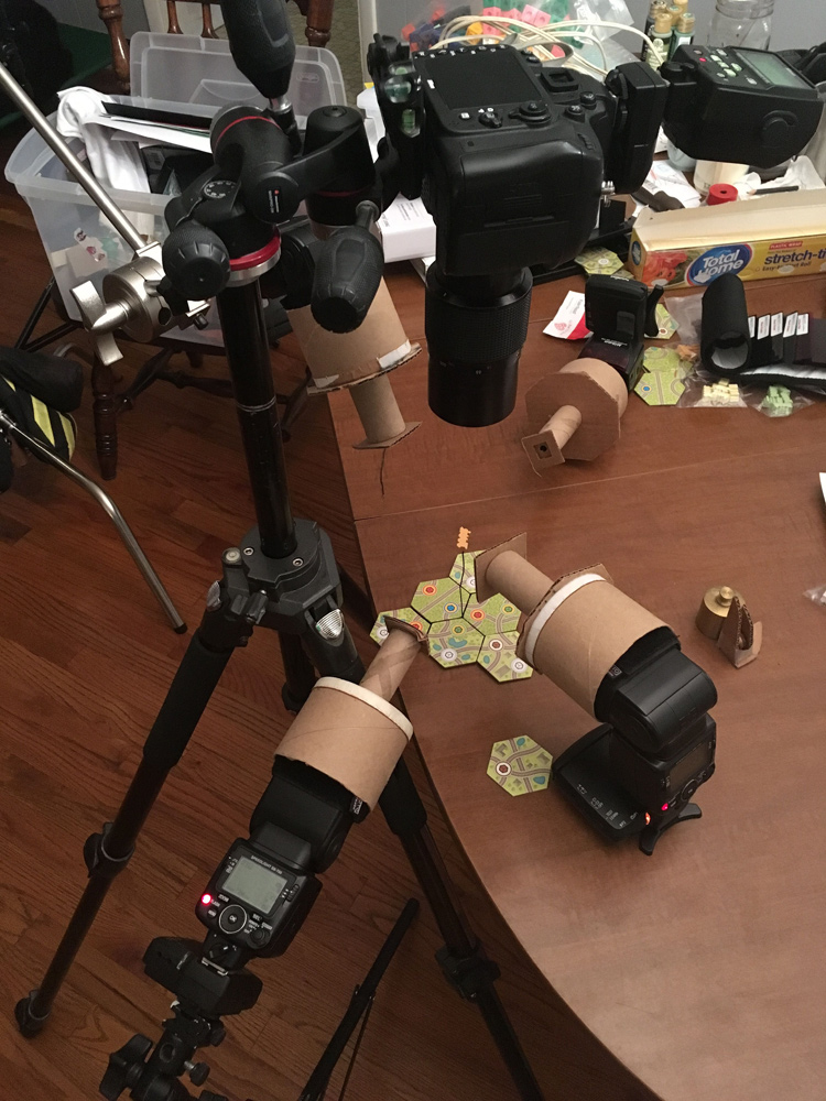 A behind the scenes photo of how the Whistle Stop train meeple was shot